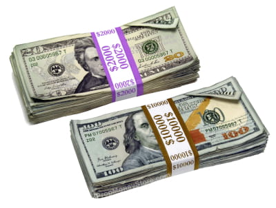 Aged full print prop $100s and $20s.